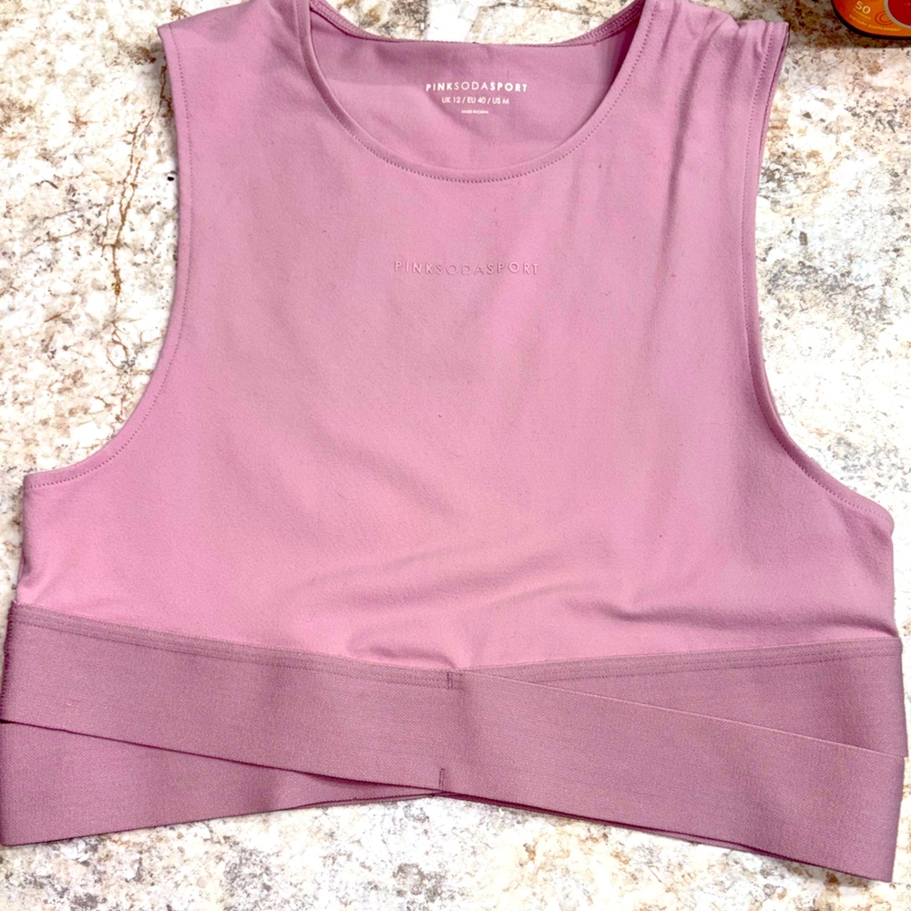 Pink Soda Sportcross Croptop- Dusty Rose
NWT
Size M